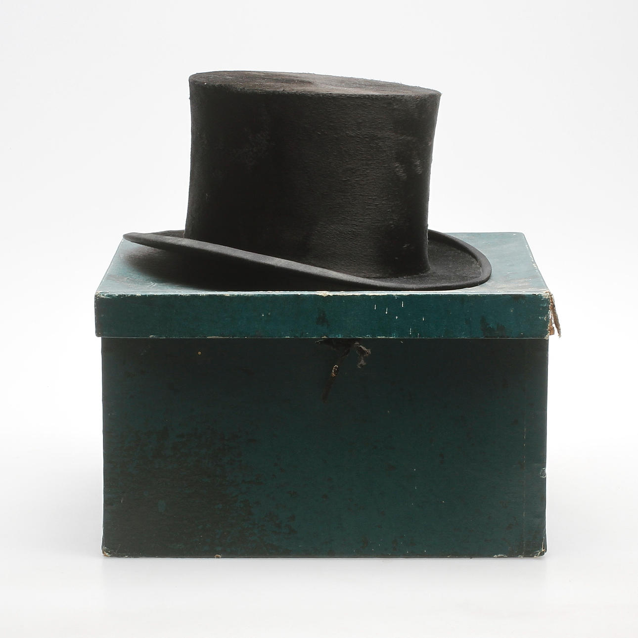 HATTA MED ASK, 1900-talets första hälft.