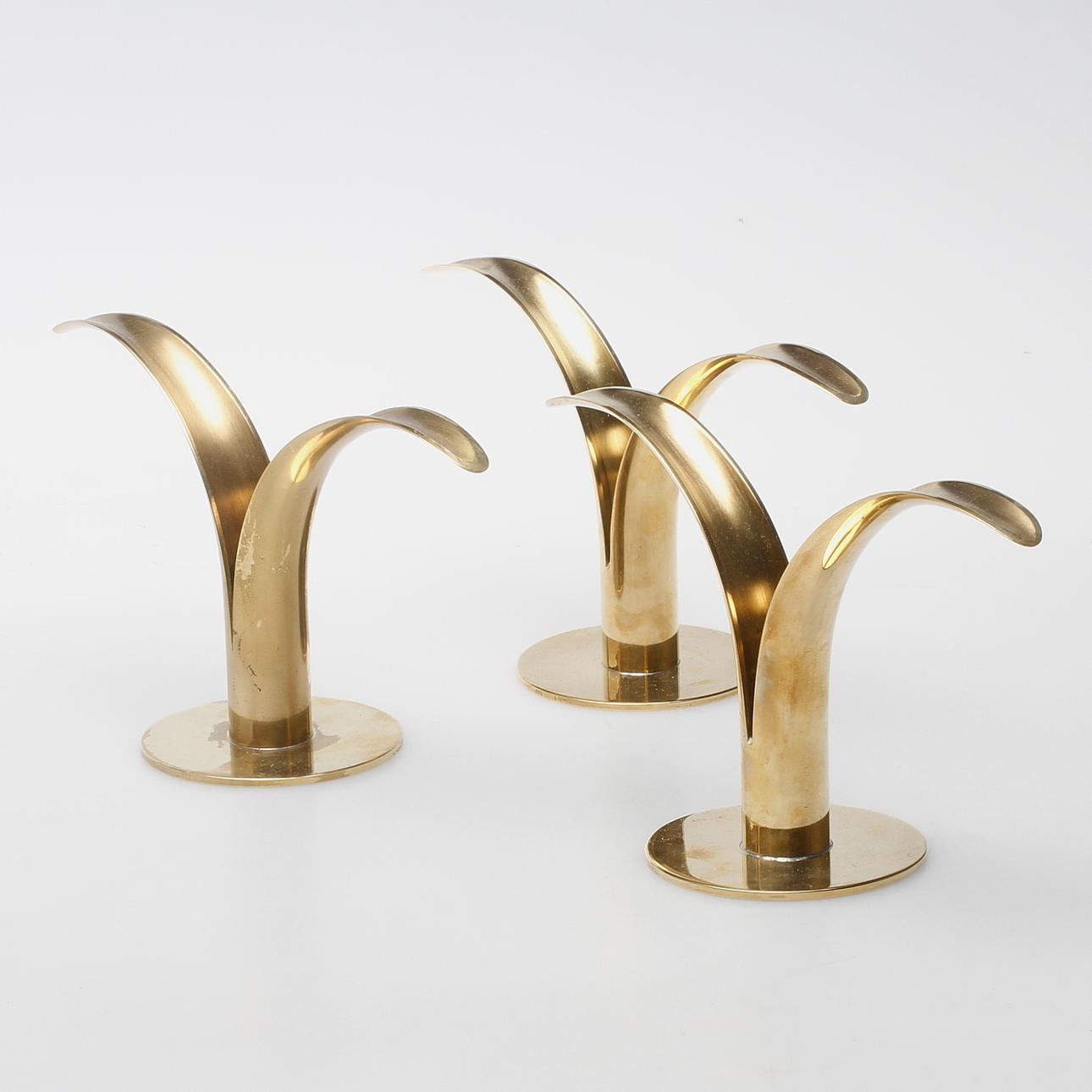 LJUSSTAKAR, 3 st, mässing, "Liljan", Ivar Åhlenius Björk, Ystad Metall.