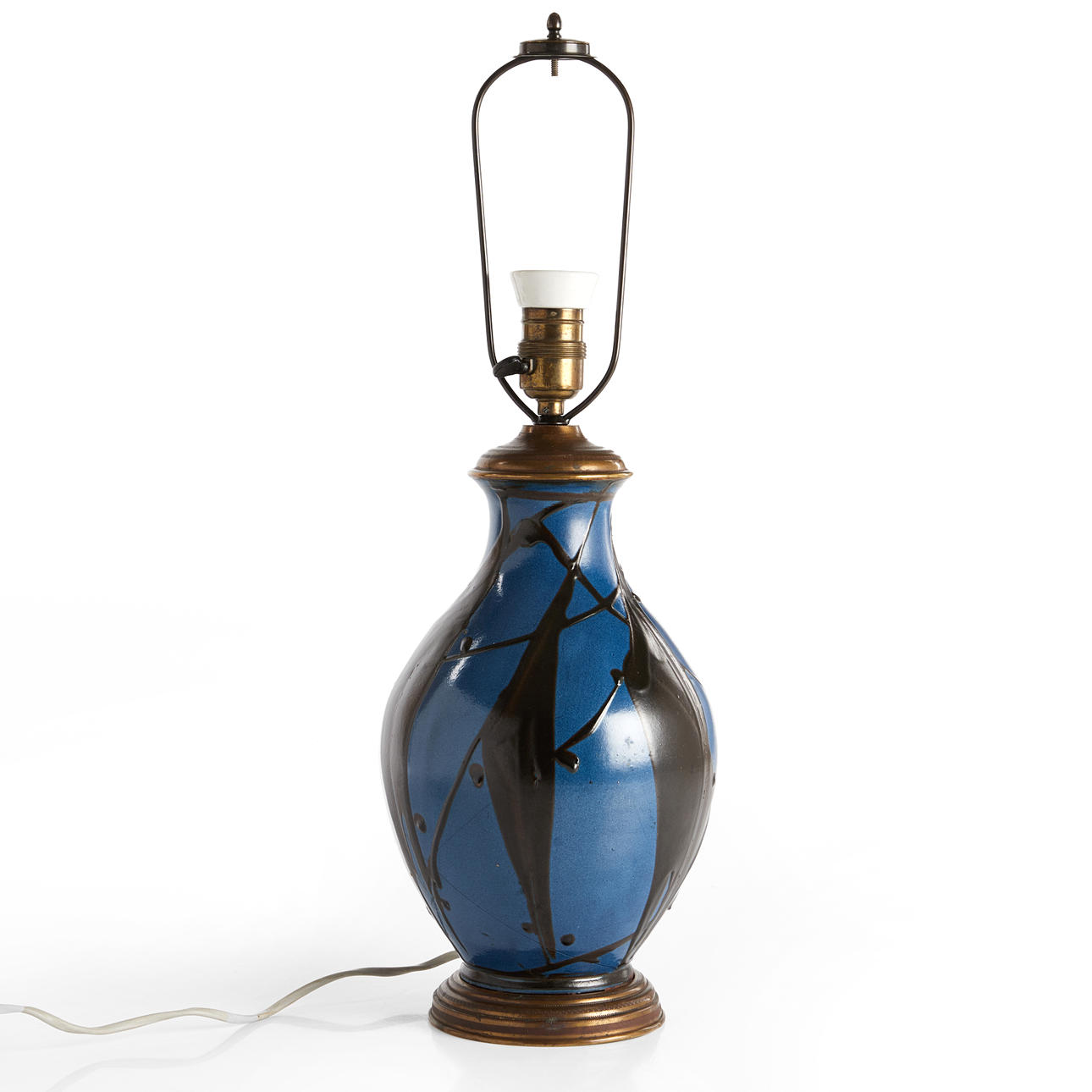 HERMAN AUGUST KÄHLER. Table lamp, glazed earthenware, signed underneath, brass fittings, glaze in black on blue base. Denmark, first quarter of the 20th century.