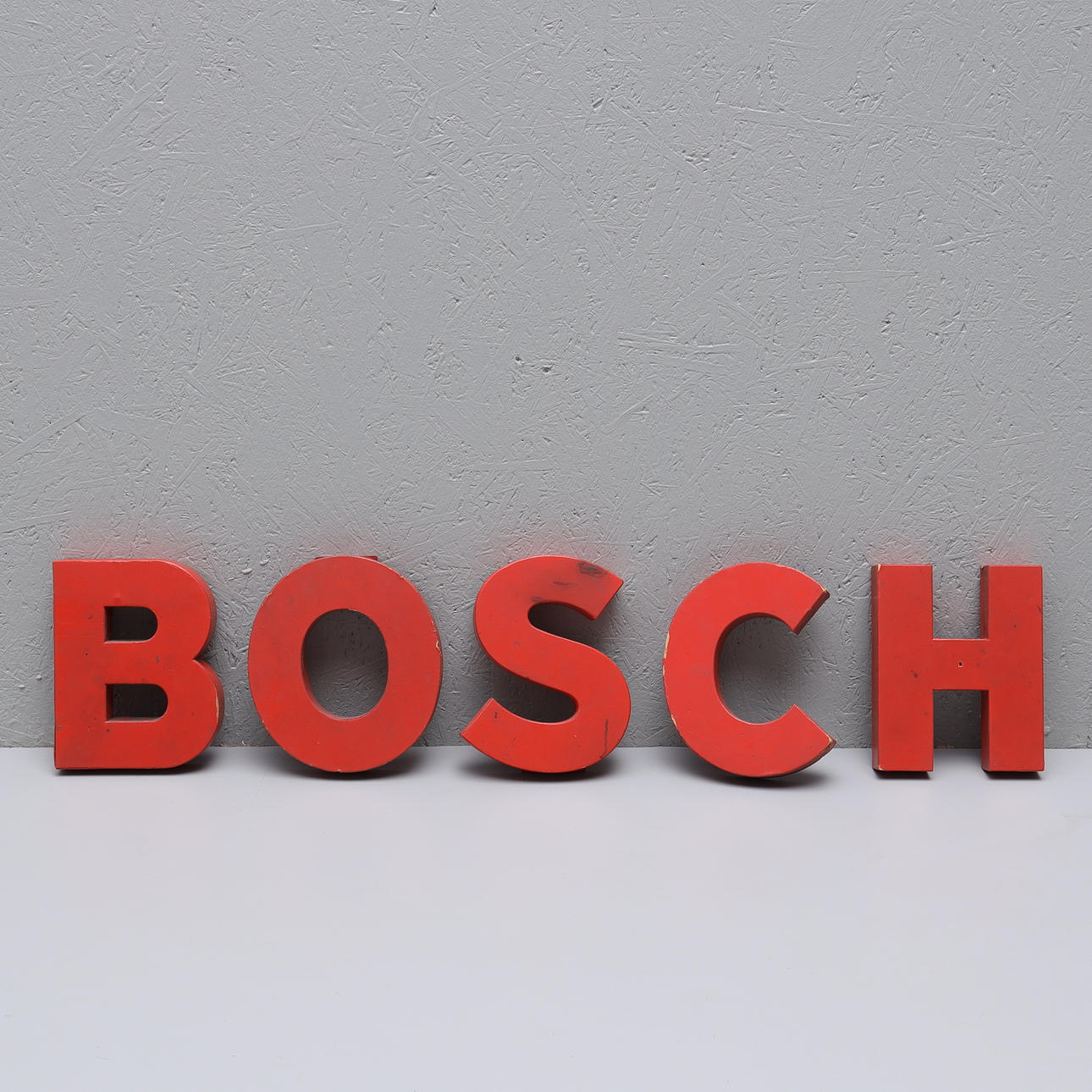 BOSCH, Bogstaver i pap, midten af 1900-tallet.