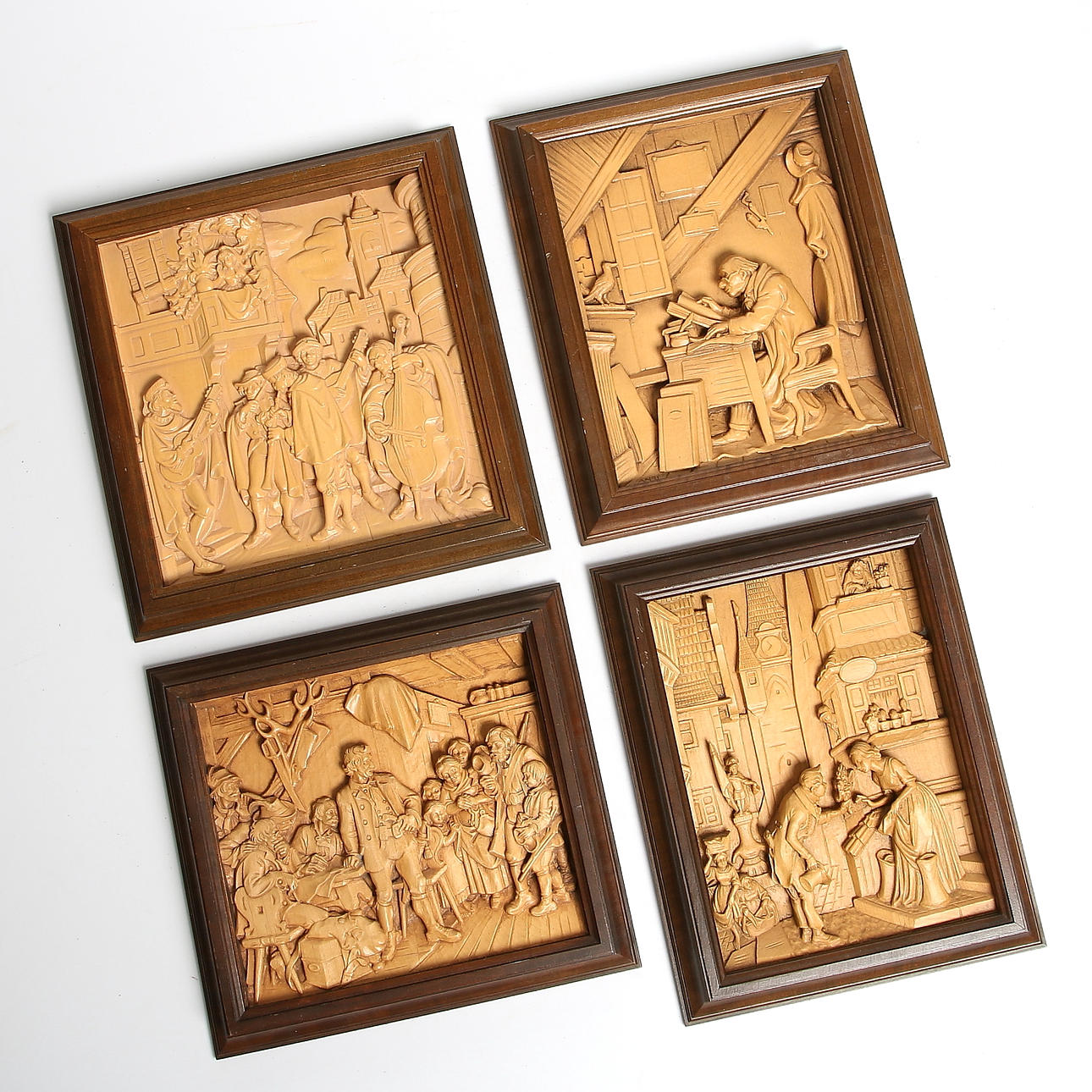 EUGEN HÖGLUNDS BILDHUGGERIVERKSTAD. Reliefer i trä, 4 st varav två daterade, 1978 respektive 1979.