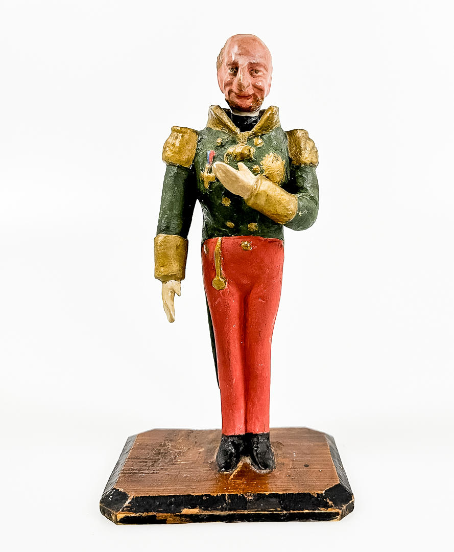 NICKED PUPPE, Holz, „Heiligabend 1876“.