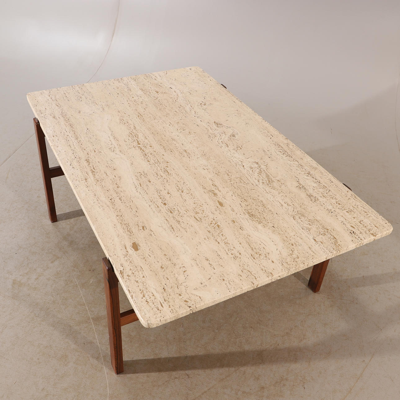 INGE DAVIDSSON. A jacaranda/travertine coffee table by Ernst Johansson ...