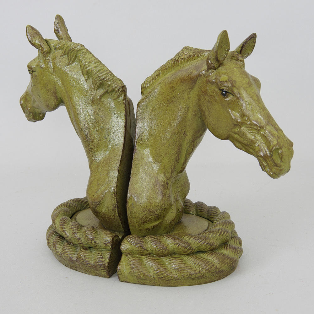 BOKSTÖD, 1 par i form av hästar, målat och gjutjärn, samtida.