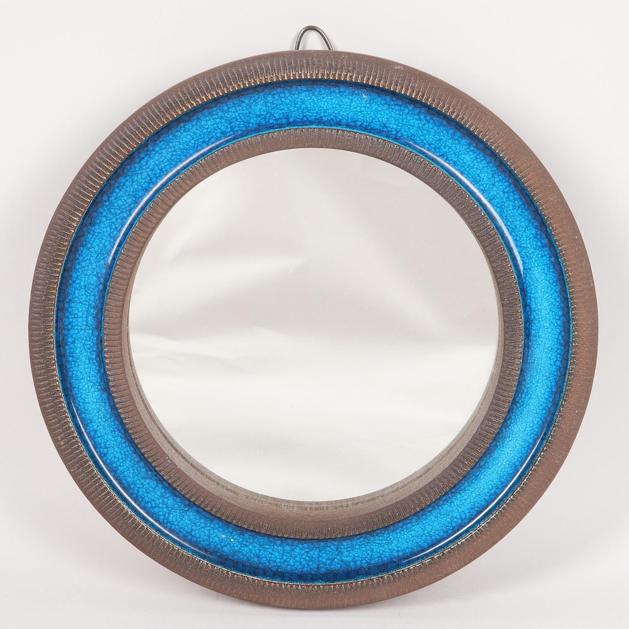 A ceramic mirror from Knastrup, Denmark.