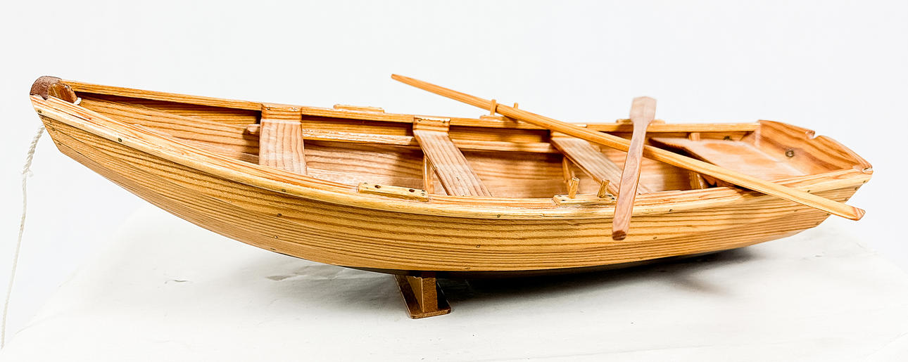 A model boat, oak, 20th century.