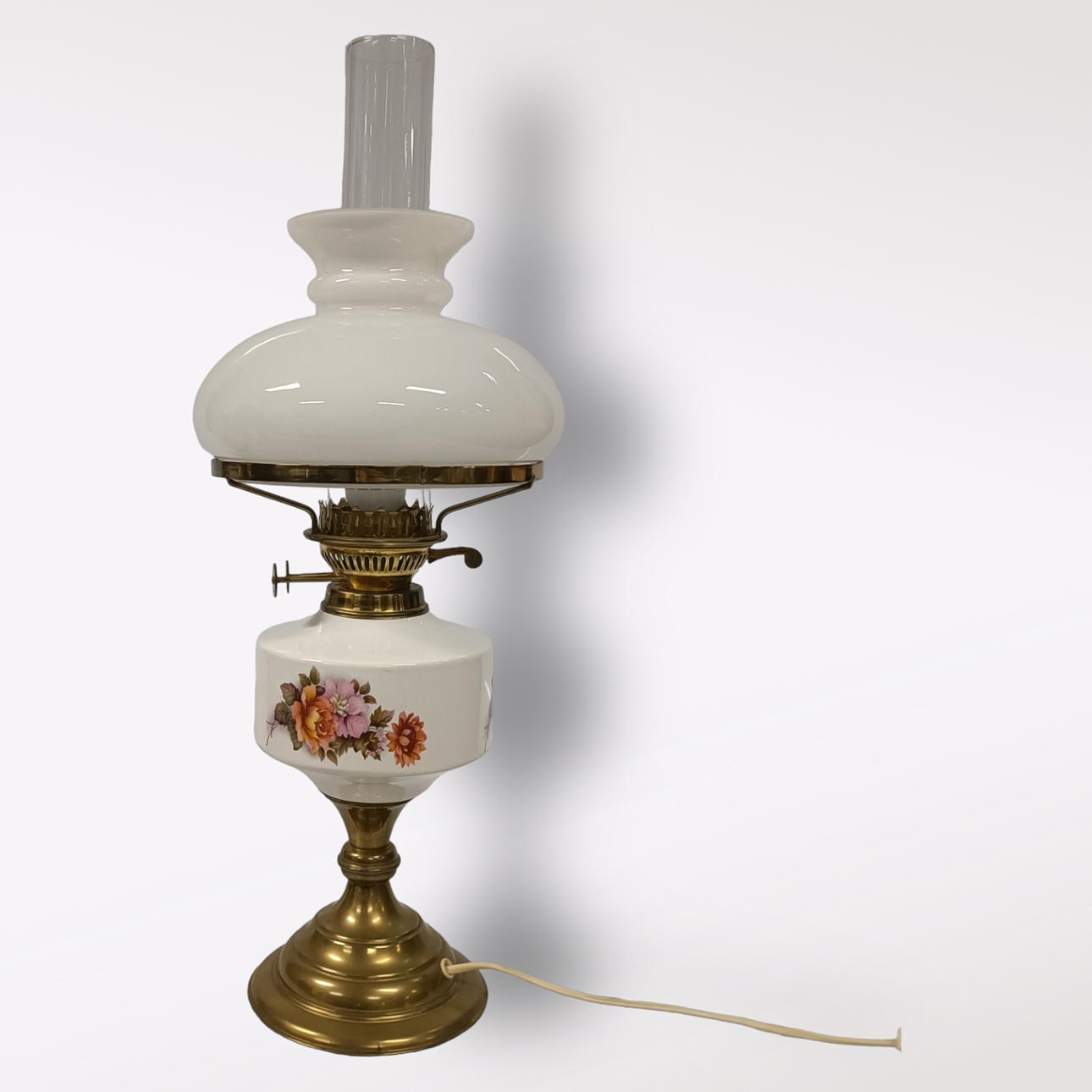 A kerosene lamp, table model, mounted electricity, 20th century.