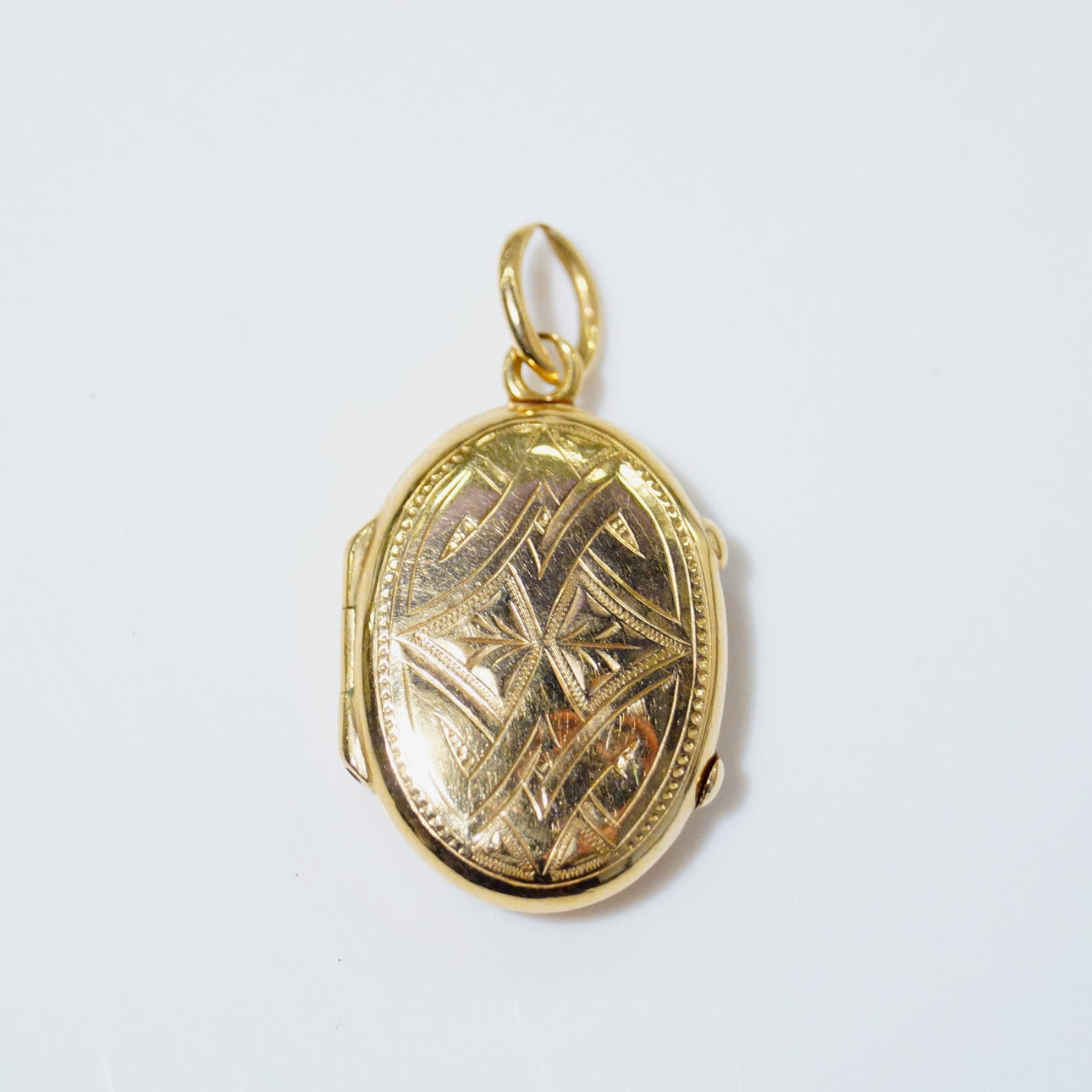 AMULET 18K.