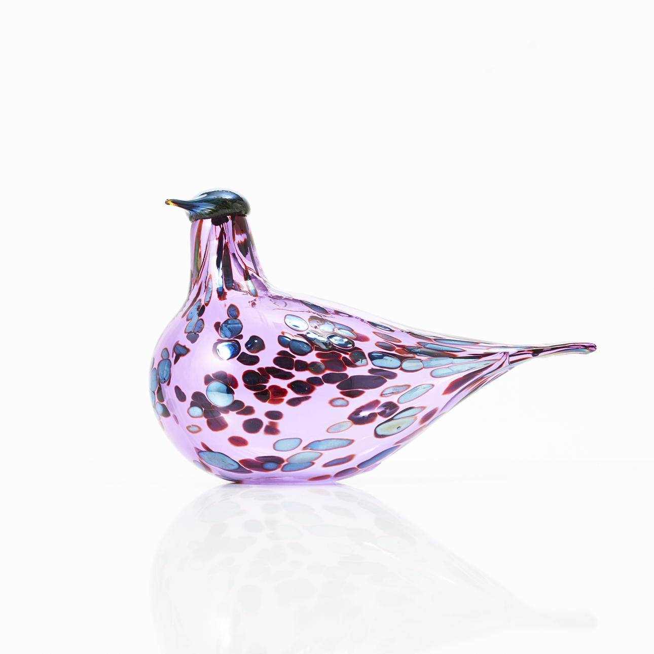 OIVA TOIKKA. “Amethyst bird”, purple glass mass, signed Oiva