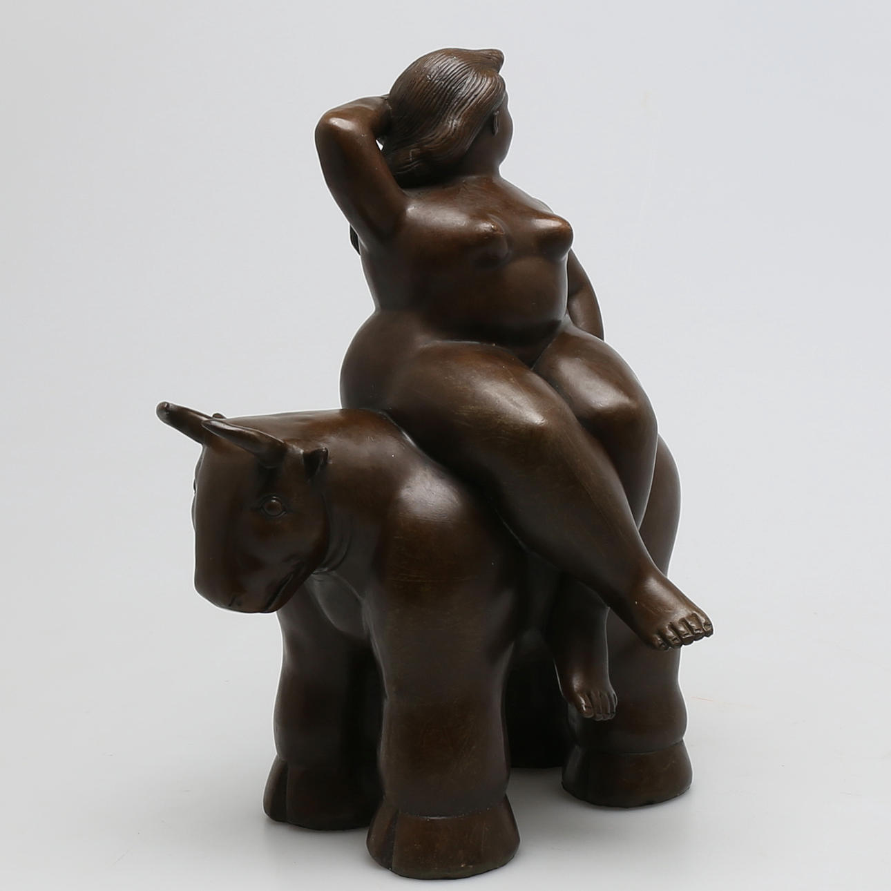 FERNANDO BOTERO. Efter, kvinna på tjur, signerad Botero, 2000-tal.