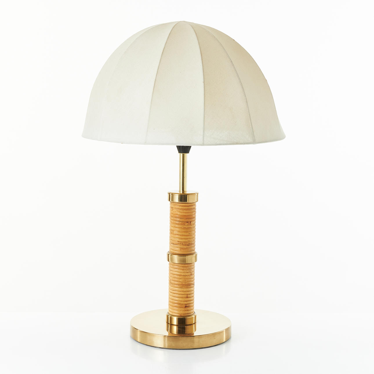 TABLE LAMP, brass frame, stem wrapped with rattan, textile covered screen.