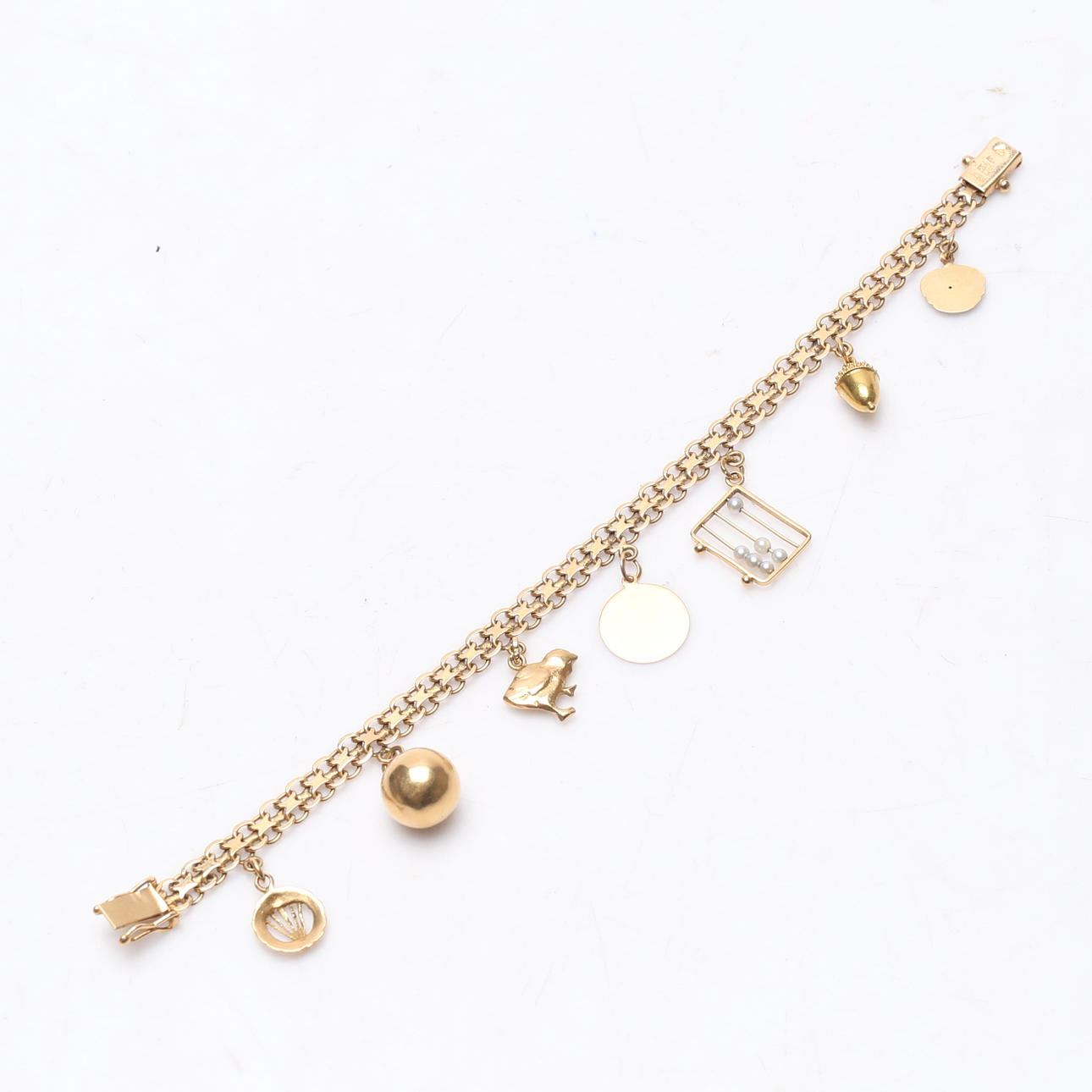 CHARM BRACELET, "X-link", total weight approx. 18.7 grams.