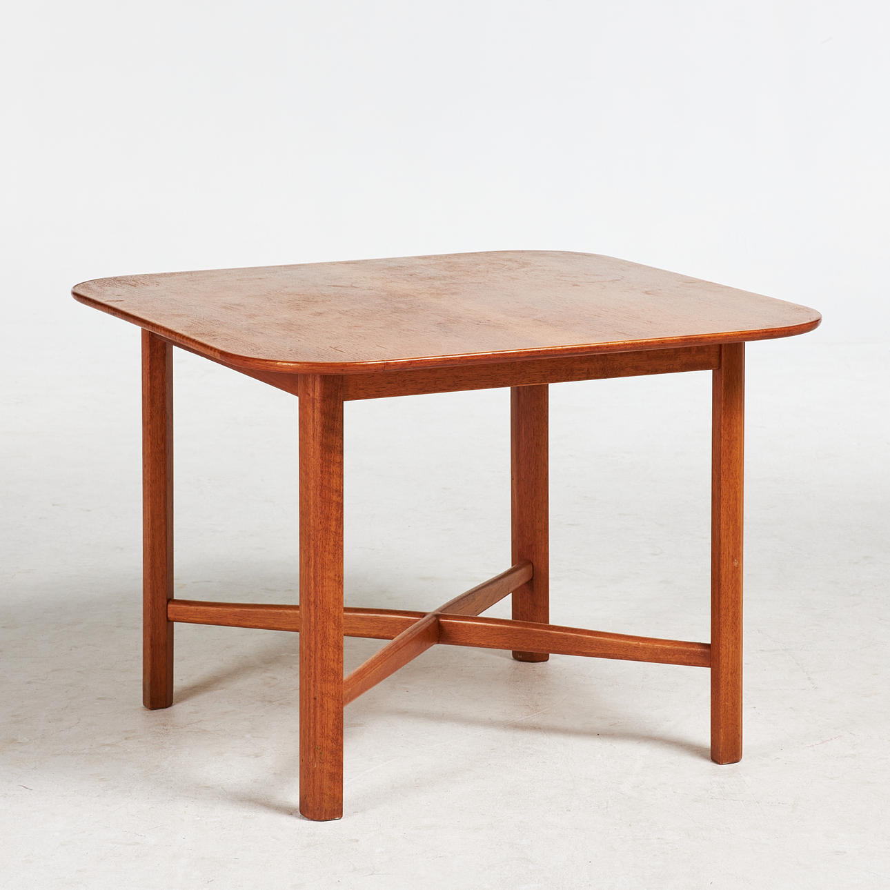 CARL MALMSTEN. Coffee table “Always ready”, teak, connected legs, branded CM.