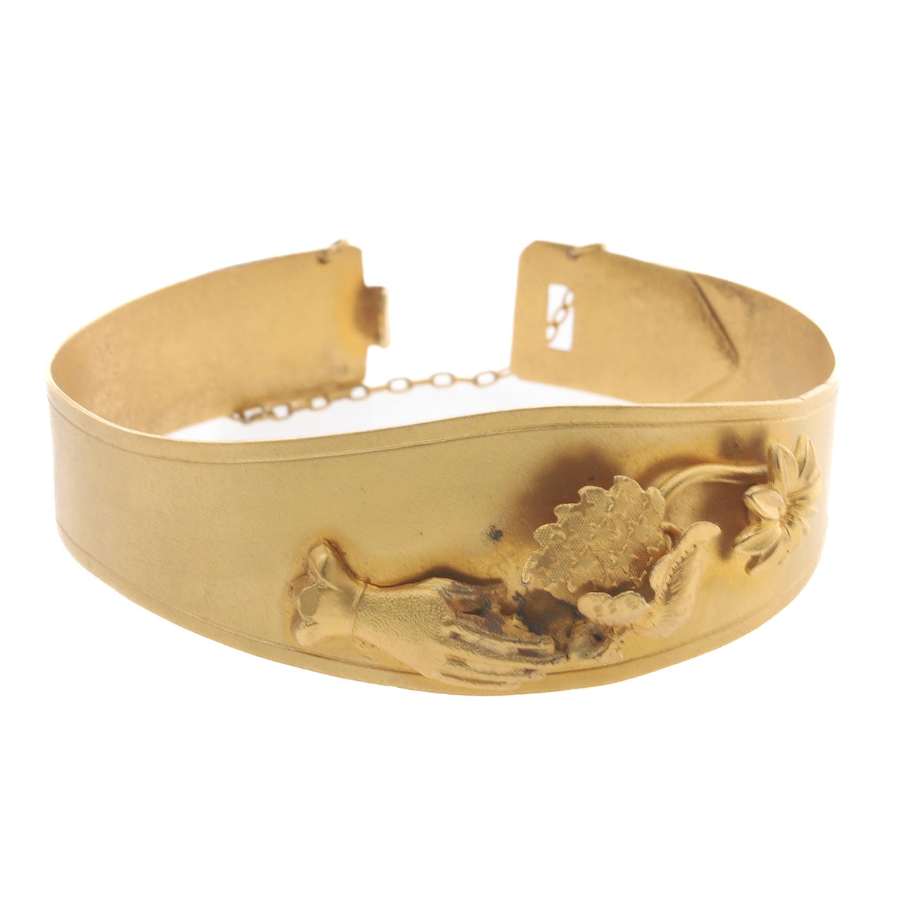 EIN ARMREIF AUS ROLLGOLD IM REGENCY-DESIGN.