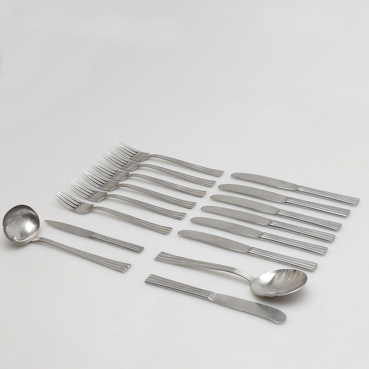 BESTICK i rostfritt stål, 16 delar "Thebe", Folke Arström, Gense.