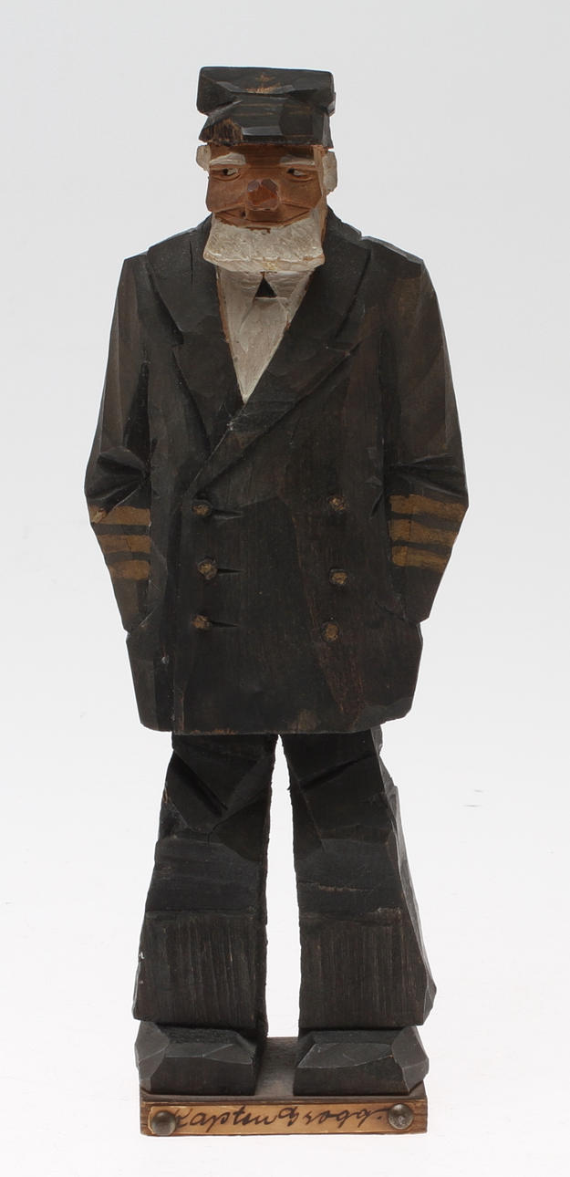 OKÄND KONSTNÄR. "Kapten Grogg", snidat trä, signerad och daterad 1923.