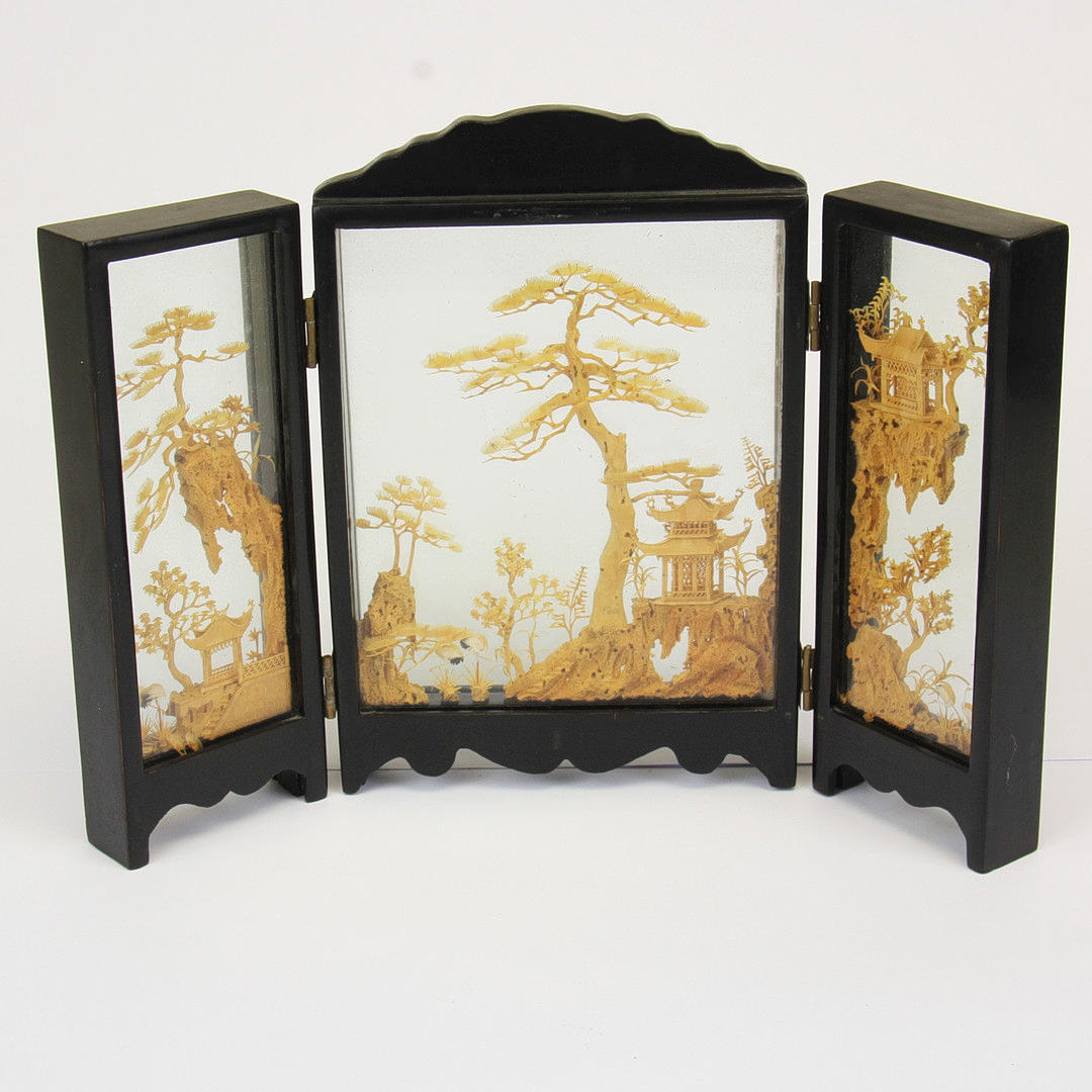 CASED CHINESE CORK CARVING.