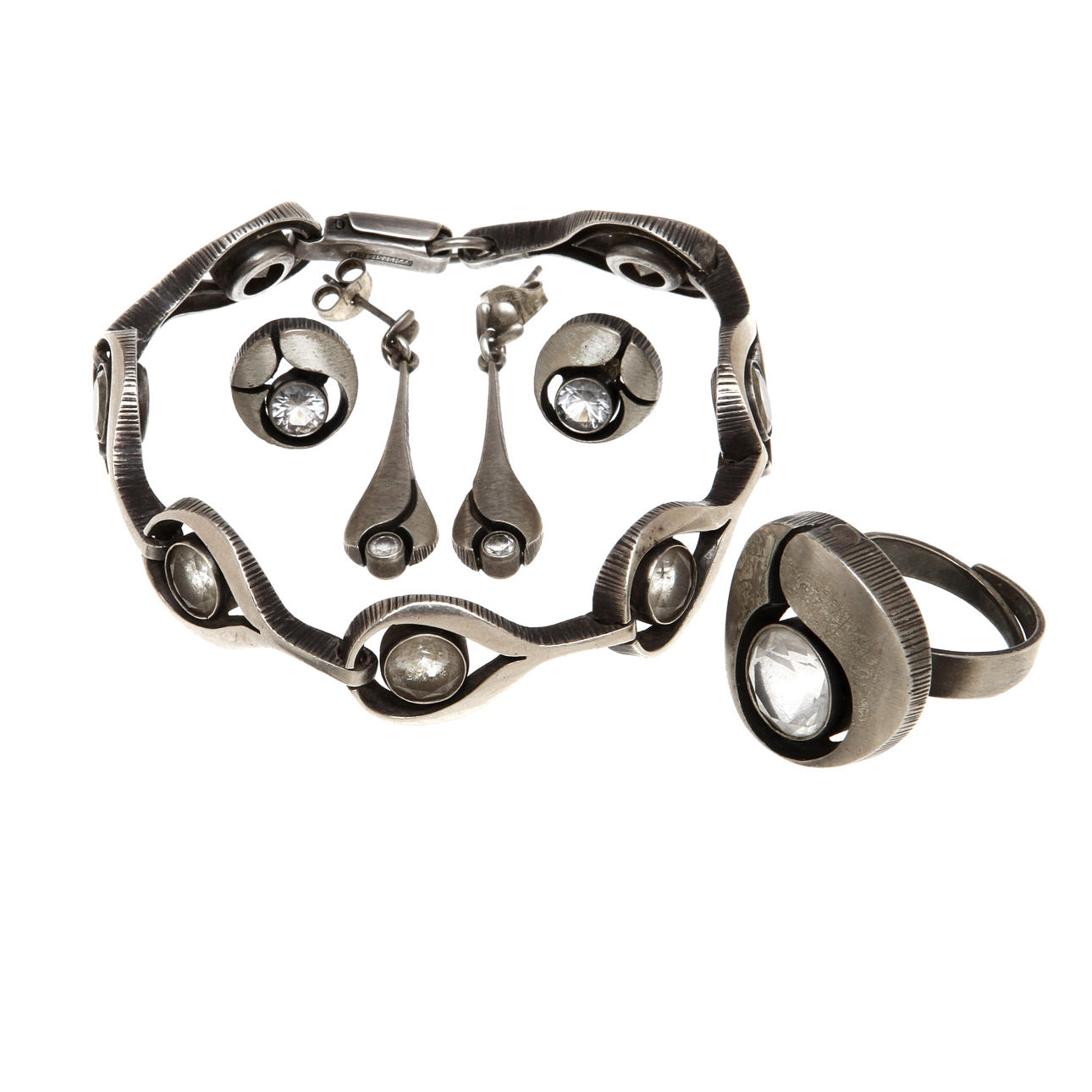 SMYCKEN, 4 delar, silver samt bergskristall, Karl Laine.