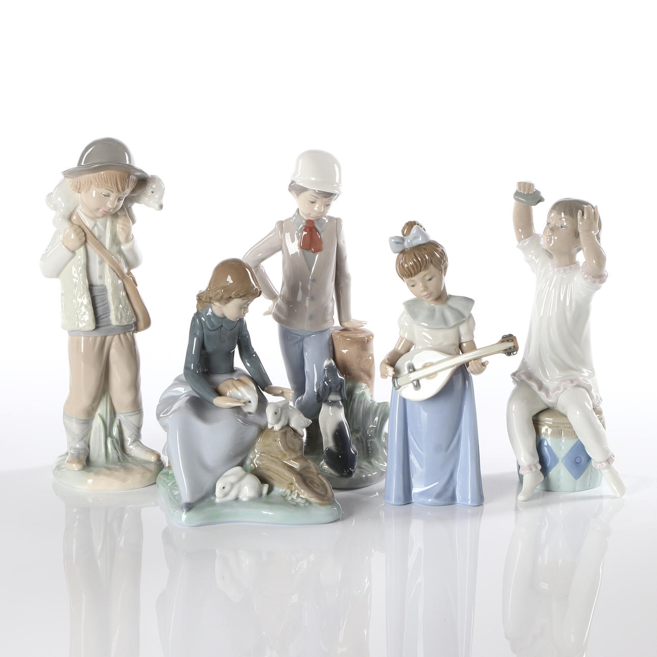 FIGURINES, FIVE PIECES.