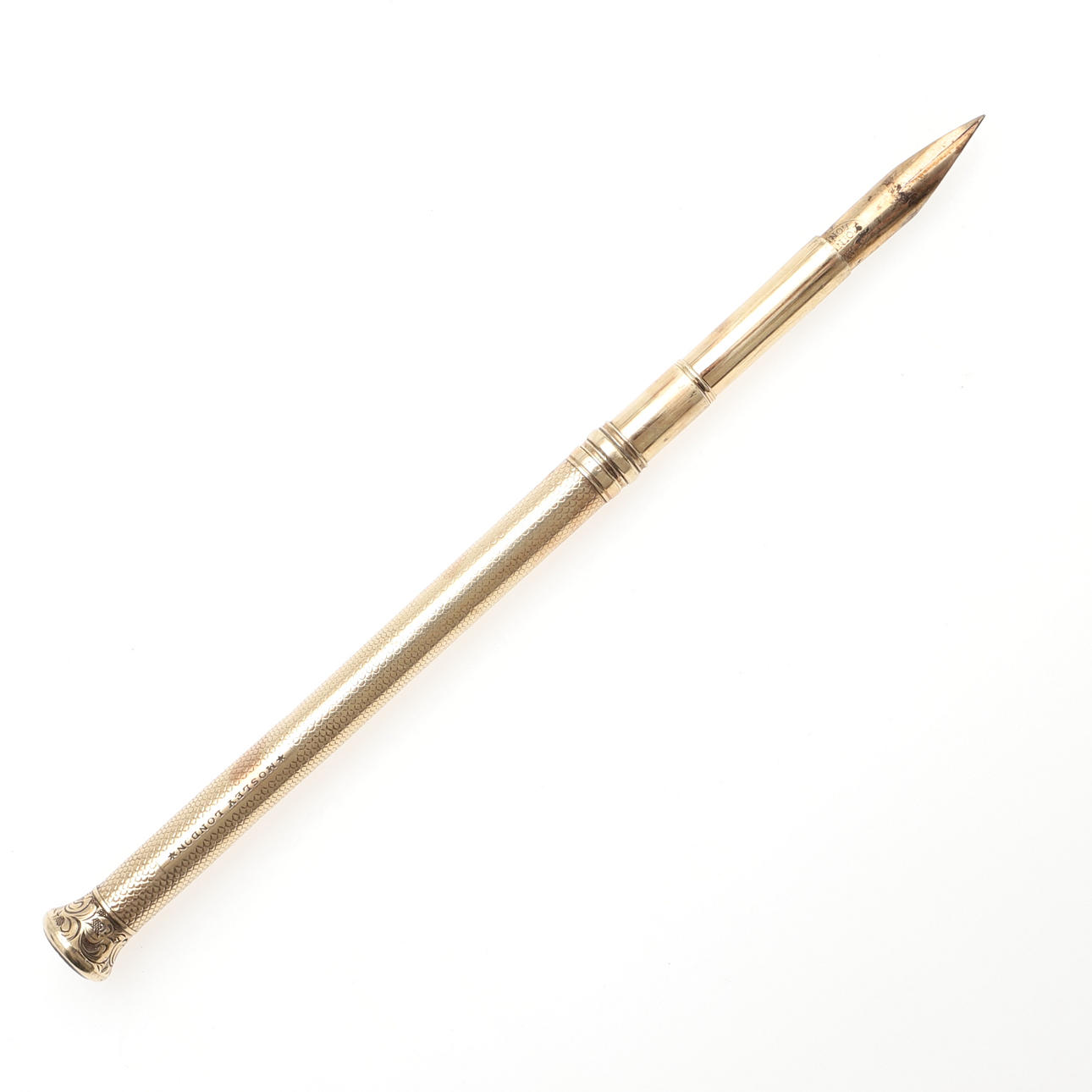 A GOLD PEN/PENCIL BY MOSLEY LONDON. Jewellery & Gemstones - Objet 