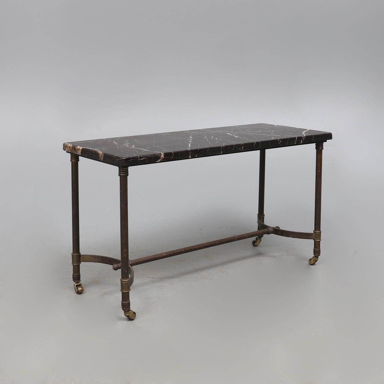 A REPRODUCTION REGENCY STYLE BRASS FRAME LOW TABLE, CIRCA 1960'S.