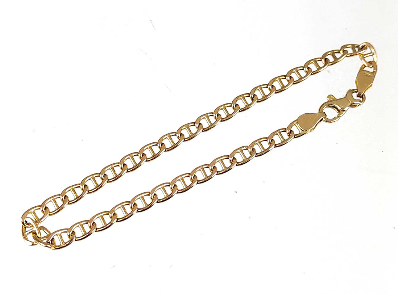 585 kultainen rannekoru.