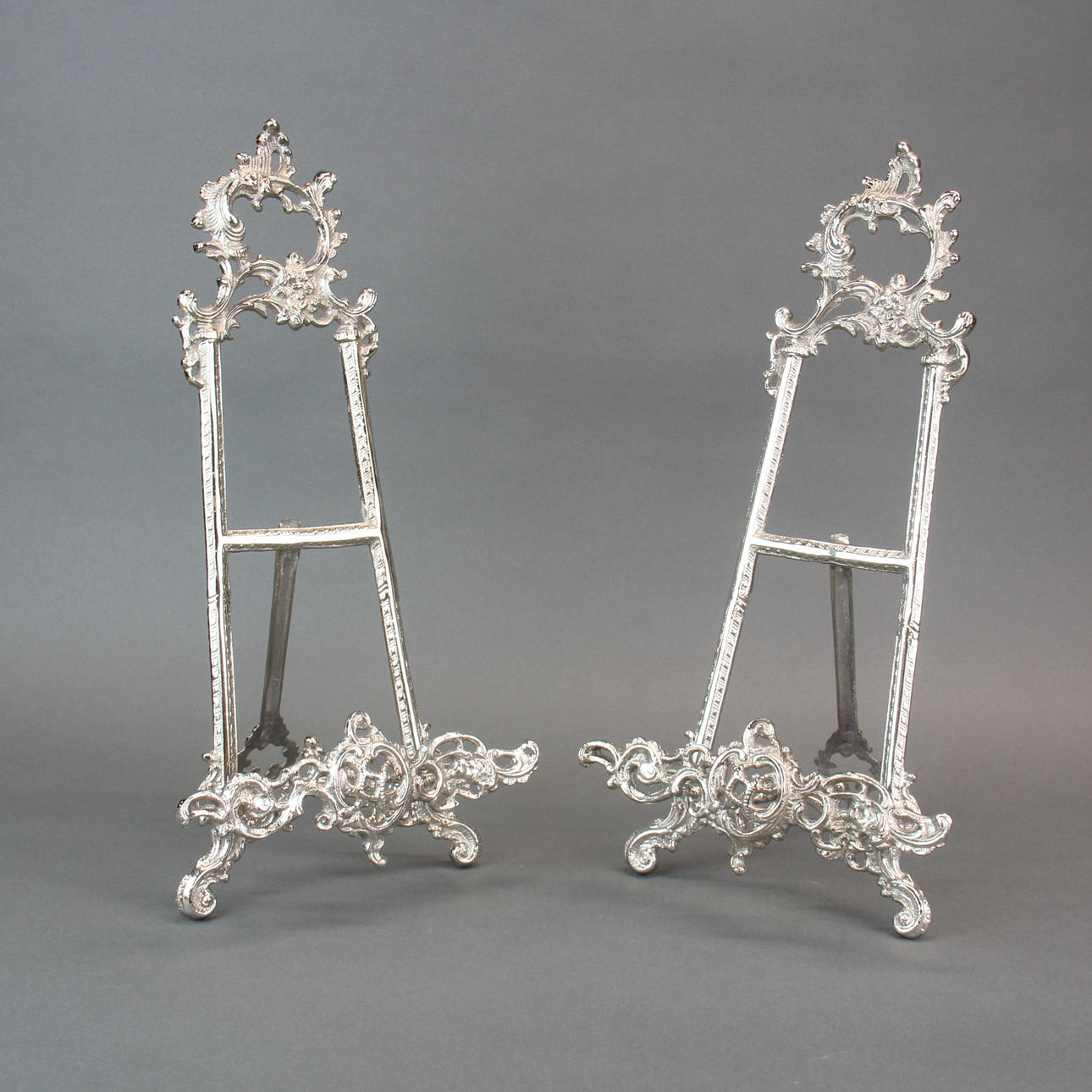 SILVERED BRASS EASELS.
