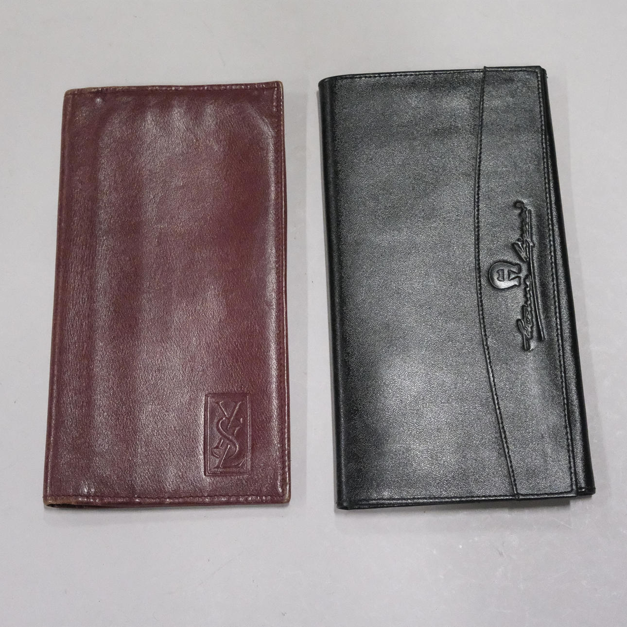 TVÅ PLÅNBÖCKER, YVES SAINT LAURENT SAMT AIGNER.