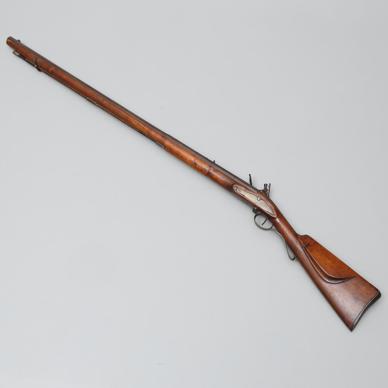 FLINT LOCK RIFLE, marked Solomon, fluted barrel.