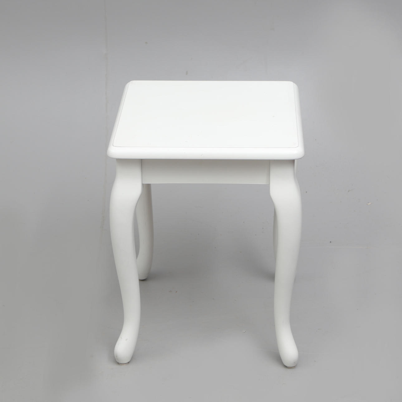 A 20th century white painted table.
