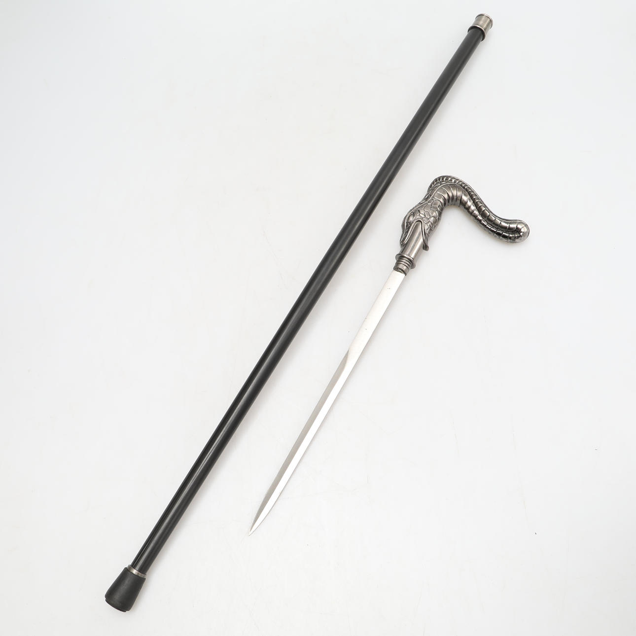 CANE with hidden dagger, snake head metal.