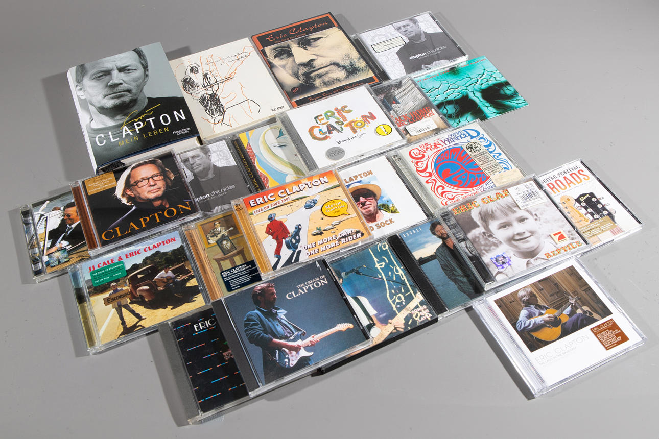 ERIC CLAPTON. 1 libro, 19 CD, 2 DVD (181-50).