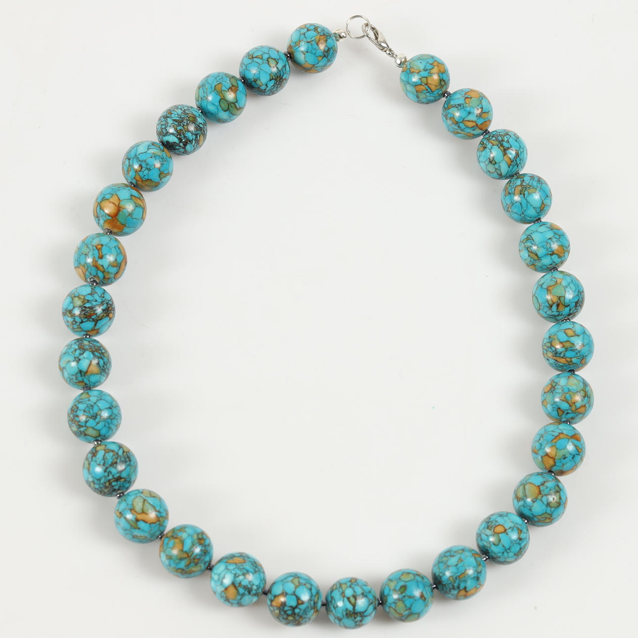 KAULAKORU, pallohiottu turkoosi.