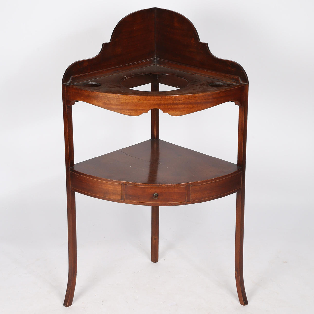 A 19TH CENTURY MAHOGANY CORNER WASHSTAND.