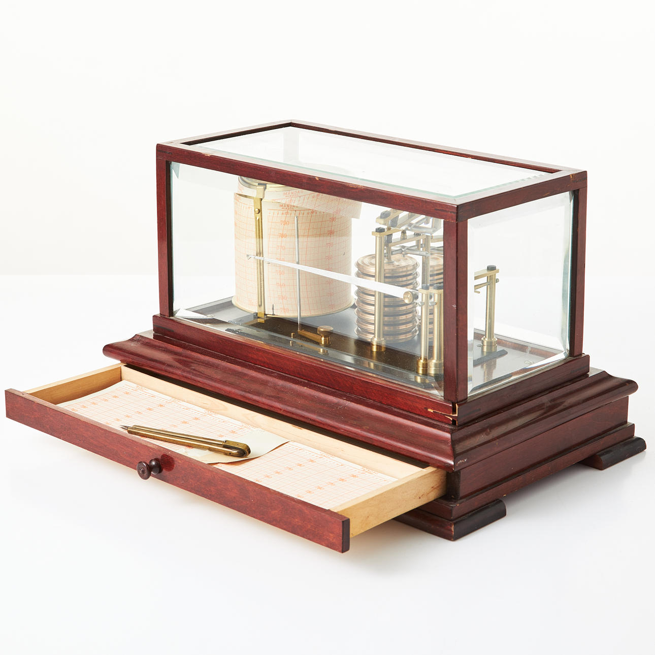 A 20th-century barograph in glass case, 4 glazed sides with faceted ...