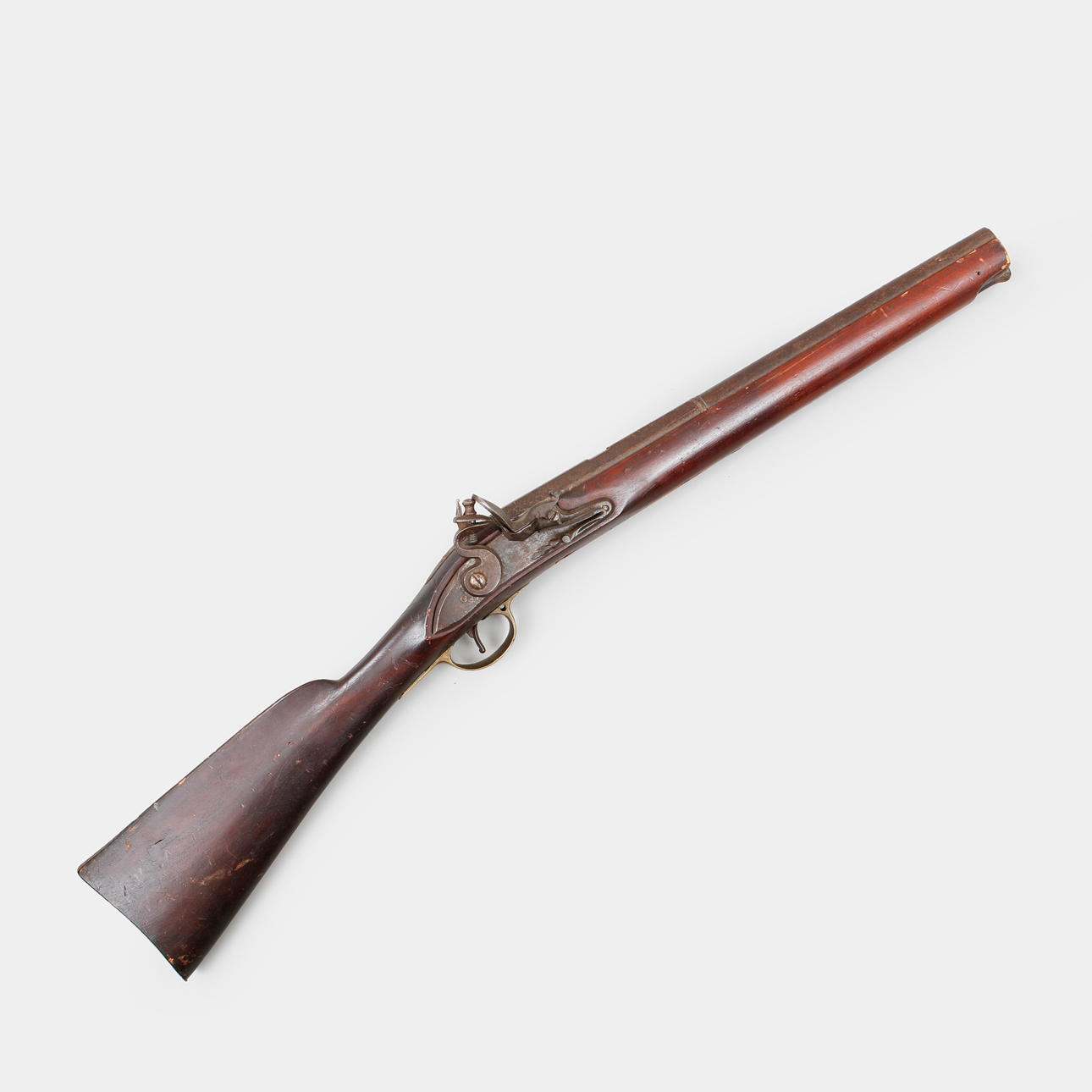 A 19th century flintlock rifle.