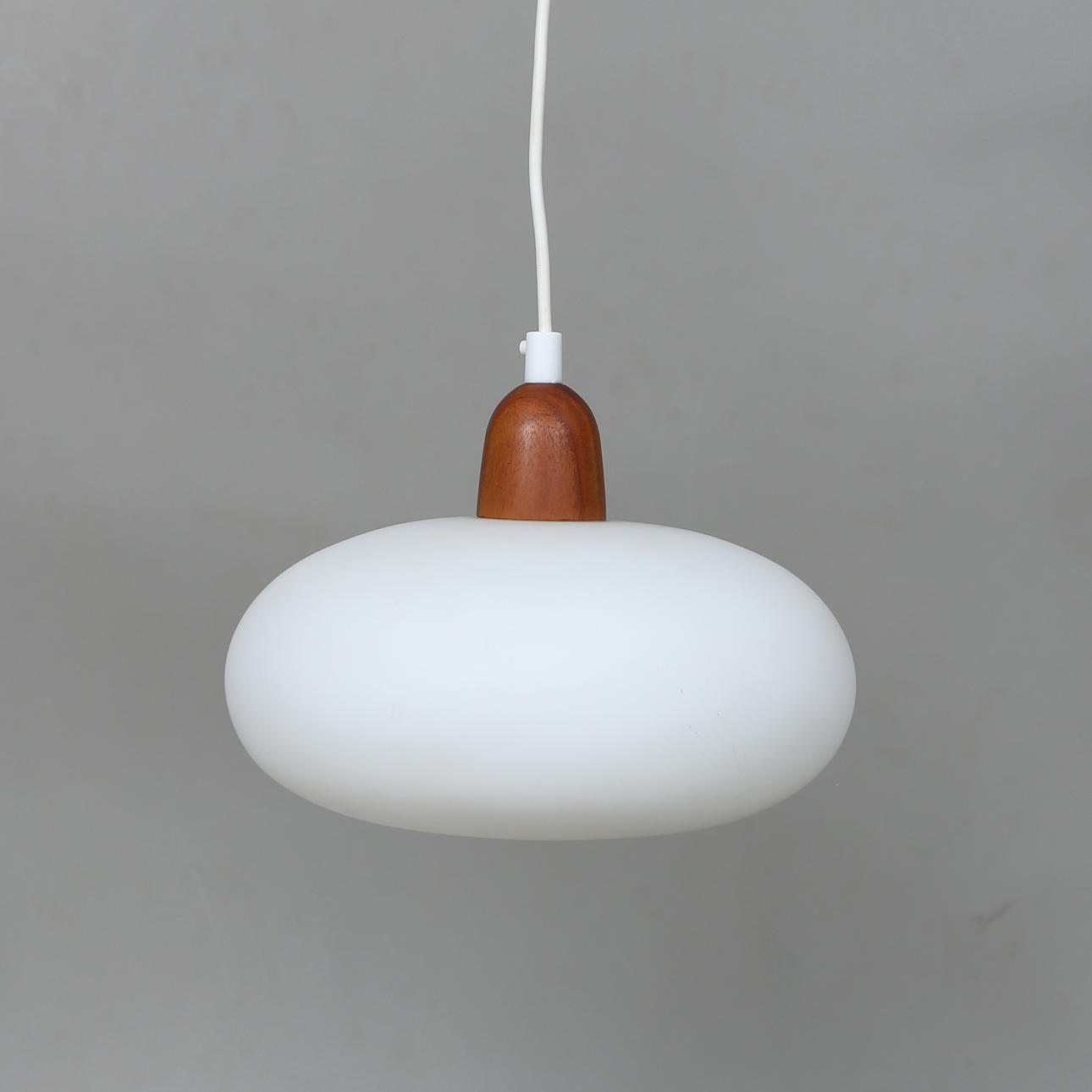 A 20th-century opal glass ceiling lamp.