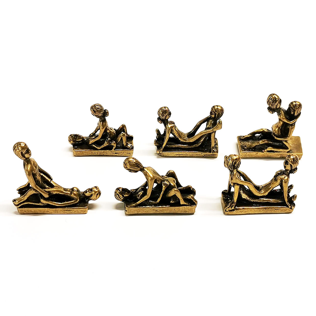 SIX BRASS MINIATURE EROTIC MODELS.