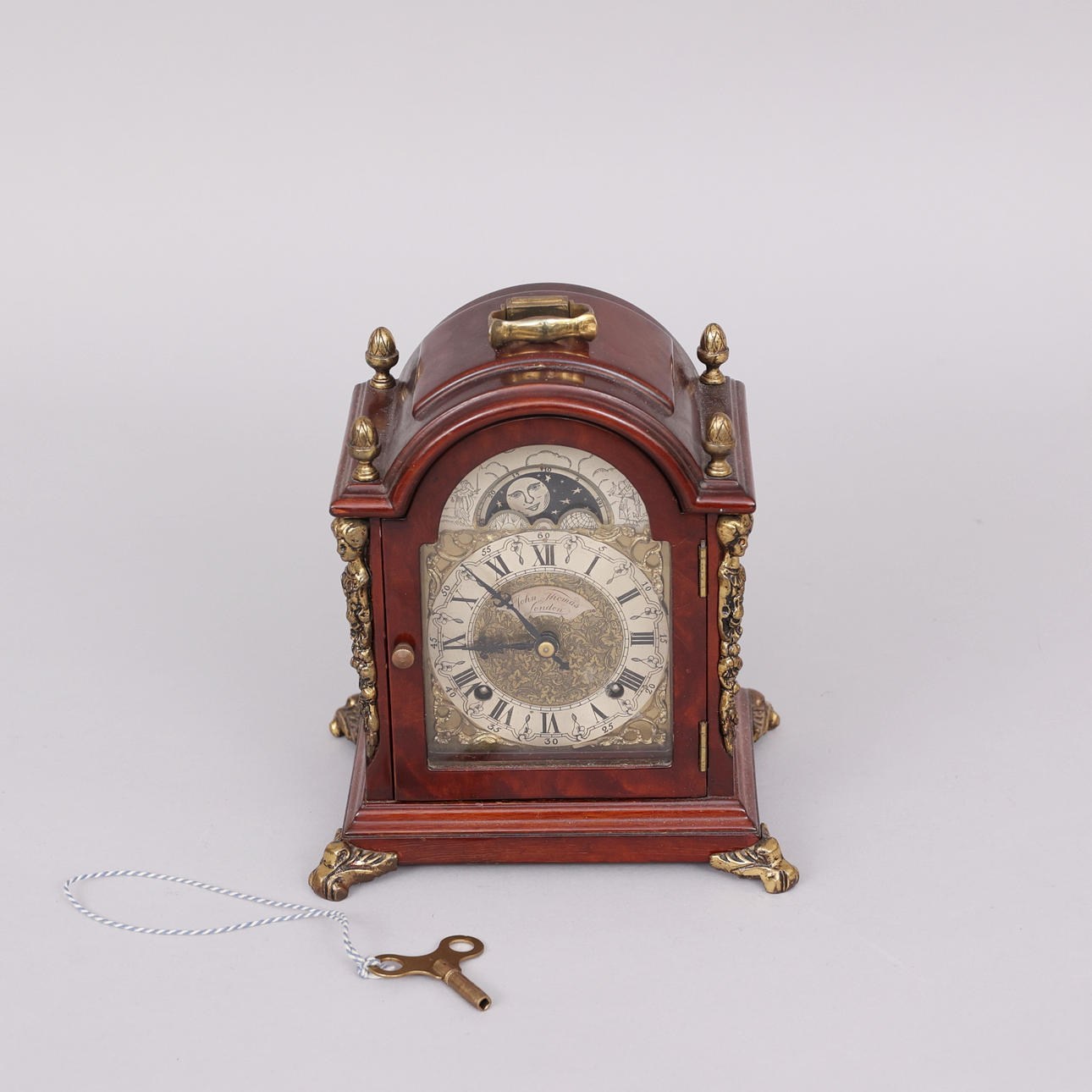 A table clock, model Westminster, moon phase, John Thomas, London