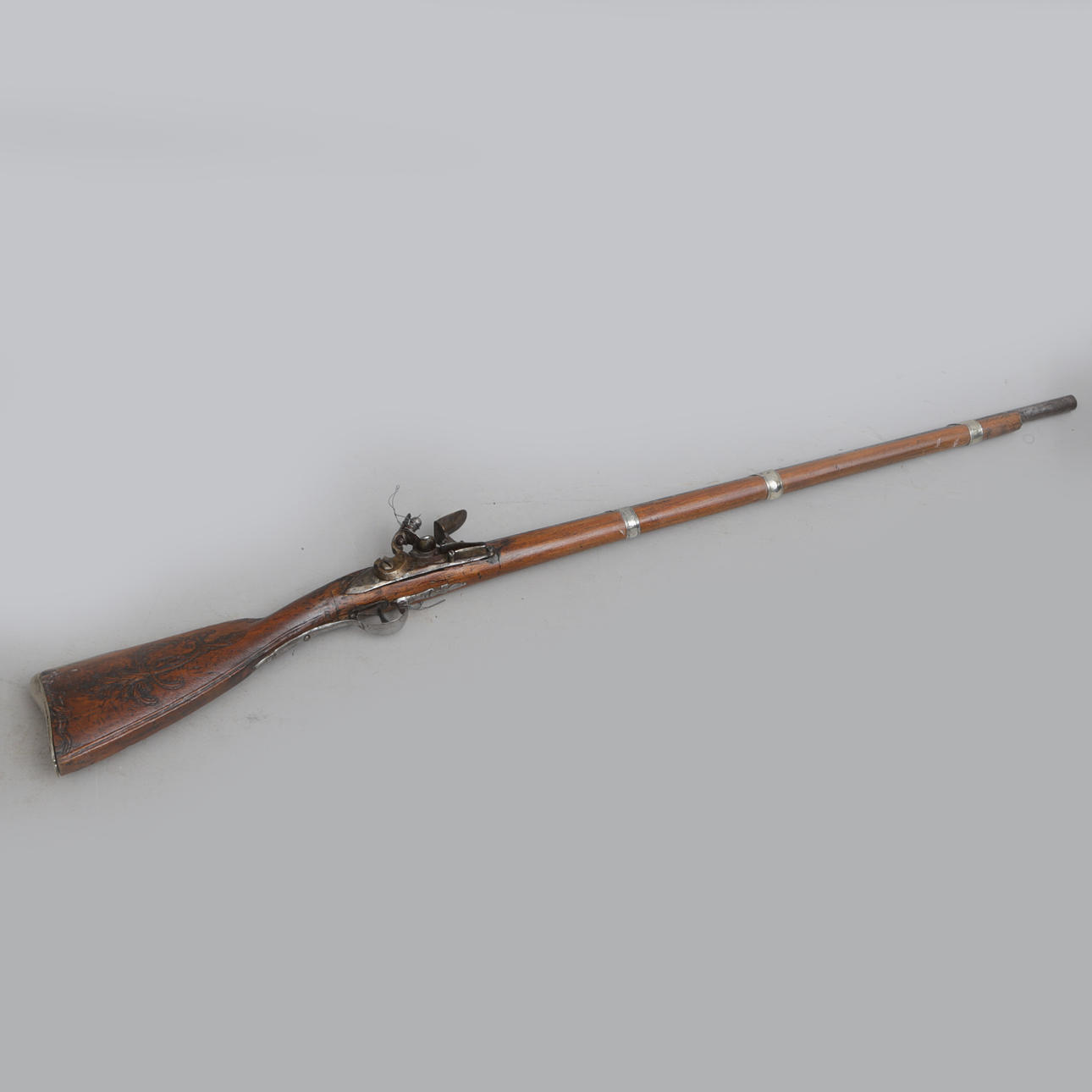A flintlock rifle, late 18th century.