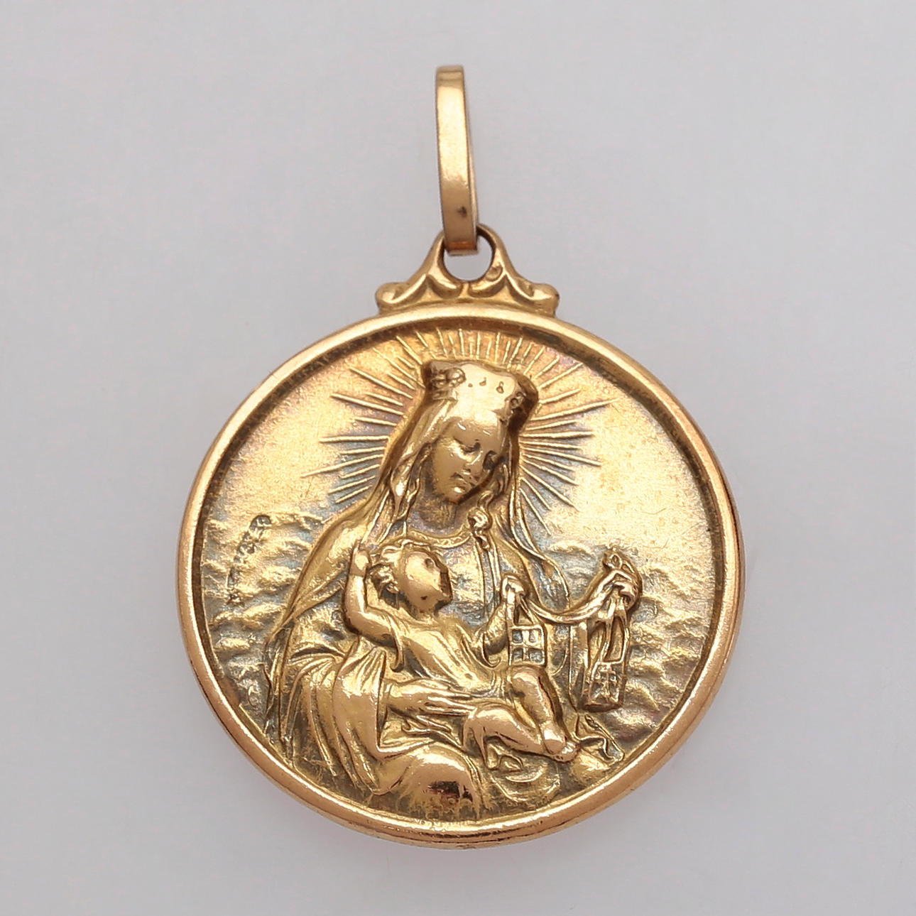 Gold devotional medal, circa 1956.