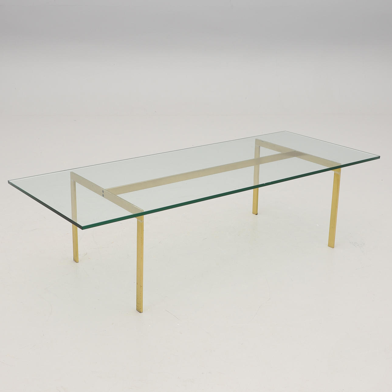 Couchtisch, Messing und Glas.