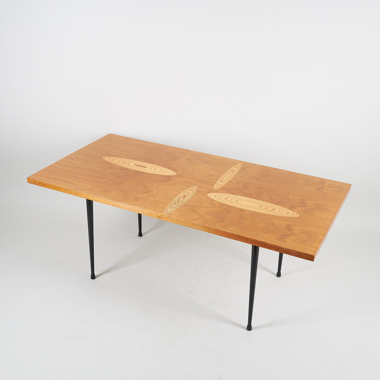 TAPIO WIRKKALA. SOFA TABLE, hardwood and rhythm-veneer, legs in metal ...