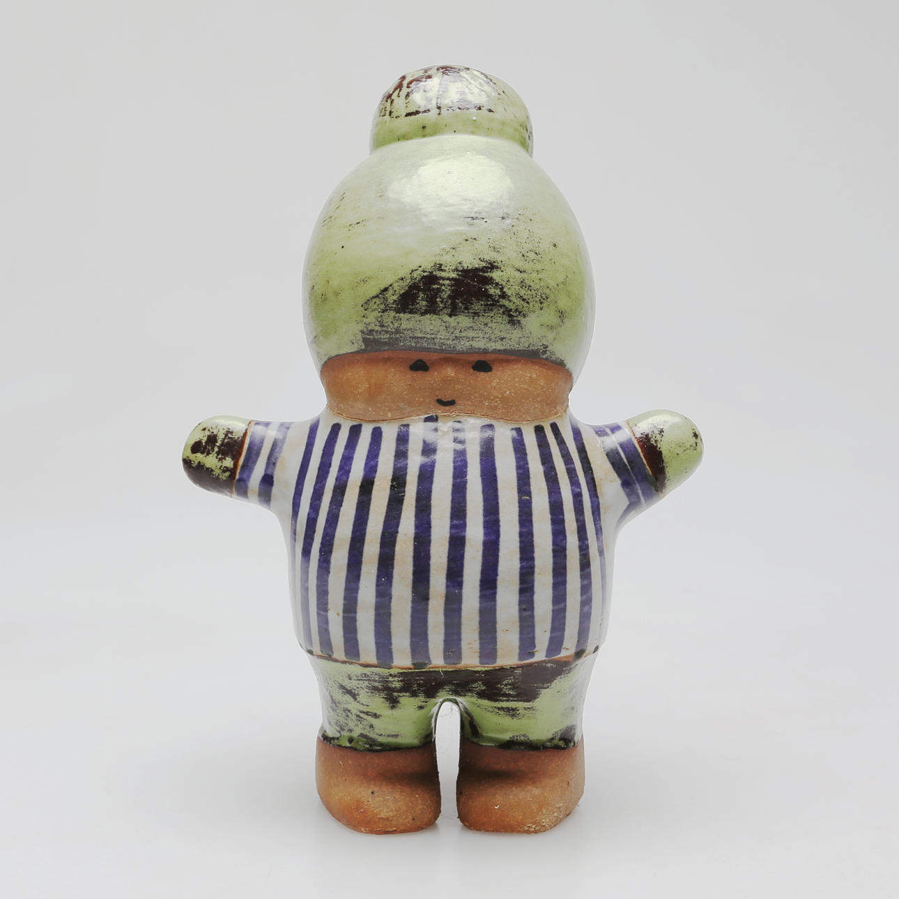 LISA LARSON. A ceramic figurine, Donald, signed.