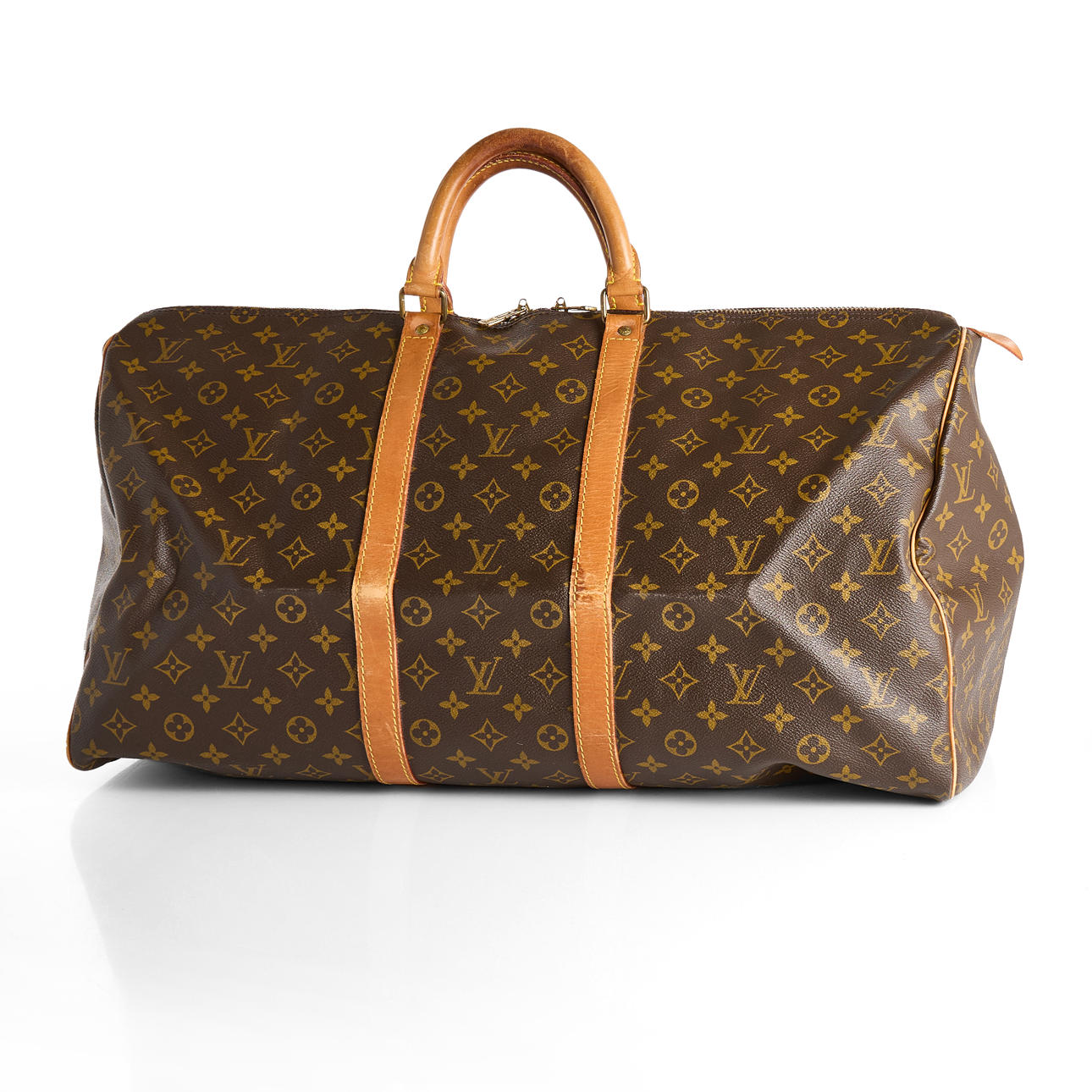 LOUIS VUITTON. Bag/weekendbag, “Keepall 55", Monogram Canvas, leather.