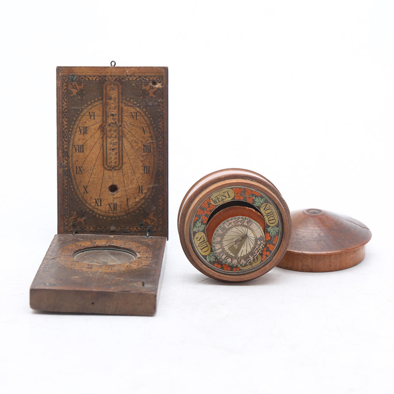 Two German compasses in lithographed and illuminated wood, 18th Century ...