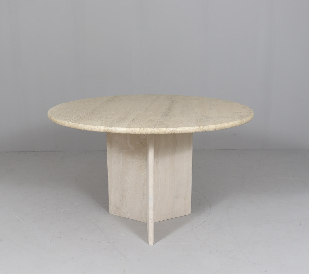 Italian travertine dining table, 1970s.
