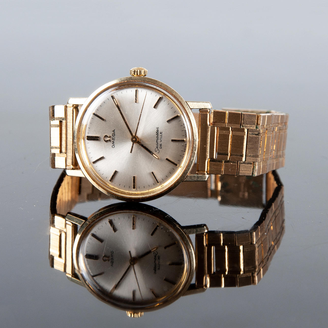 OMEGA, a 1960s Seamaster DeVille wristwatch.