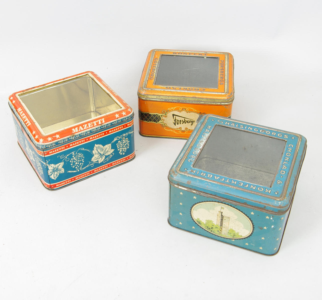 PLÅTBURKAR MED GLASLOCK, Mazetti, Helsingborg samt Göteborg.