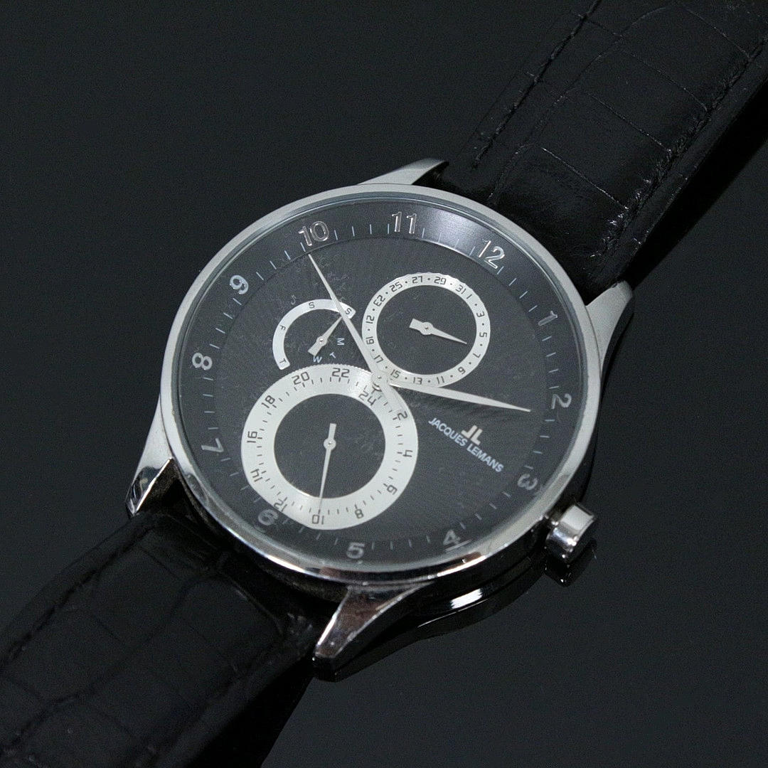 JACQUES LEMANS. Herrenarmbanduhr.